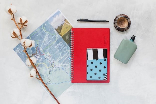 A detailed flat lay of travel souvenirs and mementos: a small notebook with travel sketches, a couple of postcards, a local artisanal craft, and a printed photo from the trip.