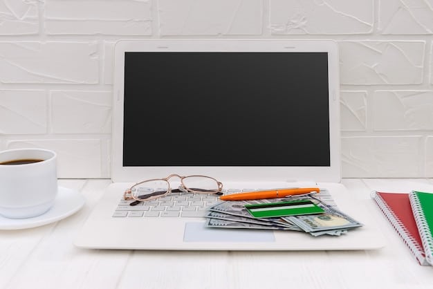 A clean, modern desk setup with a laptop displaying a financial dashboard, a calculator, a notepad with budget figures, and a credit card, symbolizing financial planning and management.