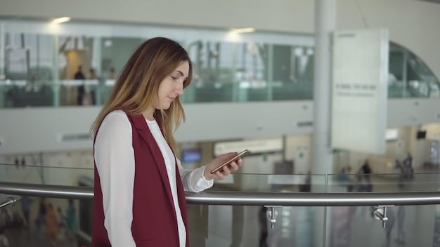 A traveler is standing confidently at an airport check-in counter, holding a credit card. The background shows blurred airport activity, with symbols of trip insurance and lounge access subtly appearing as overlays, emphasizing travel benefits.