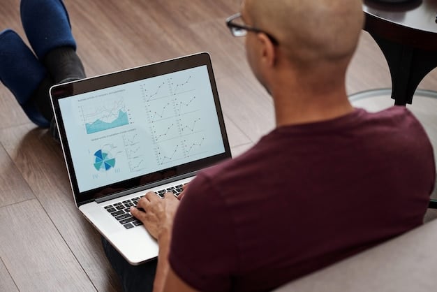 A student looking thoughtfully at their laptop screen, displaying a financial dashboard with graphs and numbers, emphasizing responsible financial management and tracking of credit card usage.