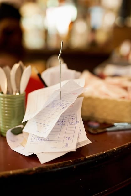 A close-up shot of a hotel bill displaying various line items, with a prominently highlighted 