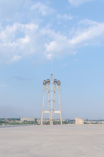 A clear image of an air traffic control tower against a blue sky, with a commercial airplane visible in the background on the runway. The focus is on the tower's vigilant role, symbolizing controlled airspace management and the integration of drone flight data.