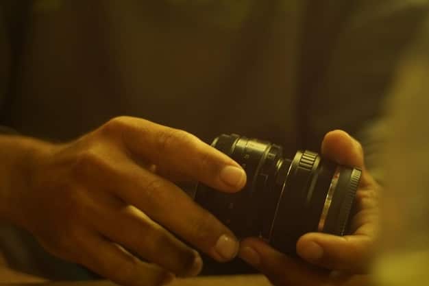 A close-up shot of a filmmaker's hands expertly adjusting the focus on a vintage cinema lens, with bokeh lights in the blurred background. It symbolizes precision and artistic control in filmmaking.