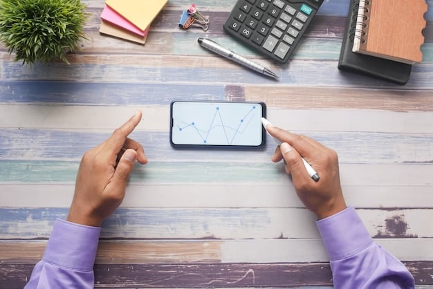 A person's hand holding a smartphone displaying a banking app with various financial metrics and credit card balances, with a calculator in the background.
