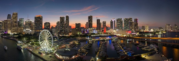 A panoramic view of the vibrant and bustling Walt Disney World in Orlando, Florida, showcasing the Magic Kingdom with Cinderella's Castle as the centerpiece, capturing the excitement and magic of Family Travel in the US: A Guide to Kid-Friendly Destinations in 2025.