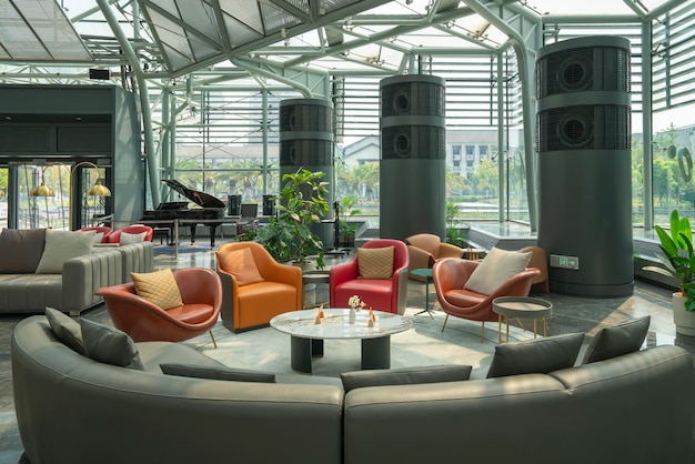 An interior shot of an exclusive airport lounge, showcasing comfortable seating arrangements, a buffet with gourmet food and drinks, and large windows overlooking the airport tarmac. The scene depicts a luxurious and relaxing atmosphere, reflecting the benefits of elite status achieved through Unlock Exclusive Perks: Achieving Elite Status with Hotel and Airline Loyalty Programs in 2025.