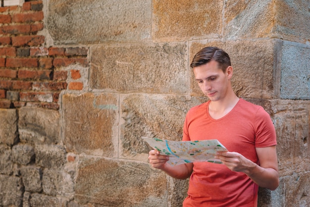 A split-screen image. On one side, a tourist is pointing at a phrasebook while communicating with a local. On the other side, the same tourist is confidently speaking the local language and interacting with the same local.